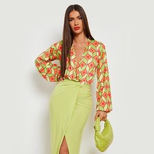 GEO PRINT WRAP BODYSUIT